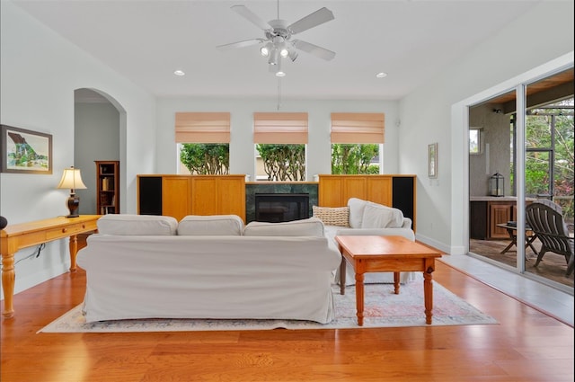 3372 Bellington Dr, Orlando, FL 32835 - living room featuring plenty of natural light, baseboards, wood finished floors, and recessed lighting