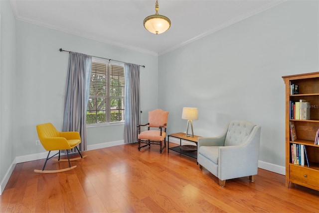 3372 Bellington Dr, Orlando, FL 32835 - living area featuring wood finished floors, ornamental molding, and baseboards