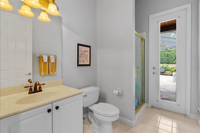 3372 Bellington Dr, Orlando, FL 32835 - full bathroom featuring vanity, toilet, a shower stall, tile patterned floors, and baseboards