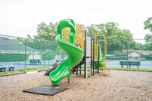 3372 Bellington Dr, Orlando, FL 32835 - communal playground featuring a tennis court