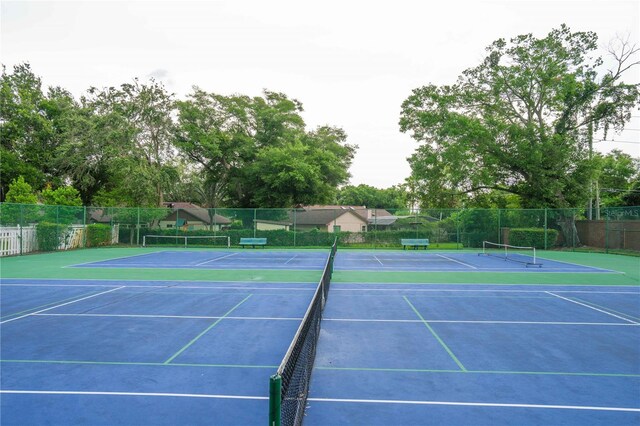 3372 Bellington Dr, Orlando, FL 32835 - view of tennis court with community basketball court