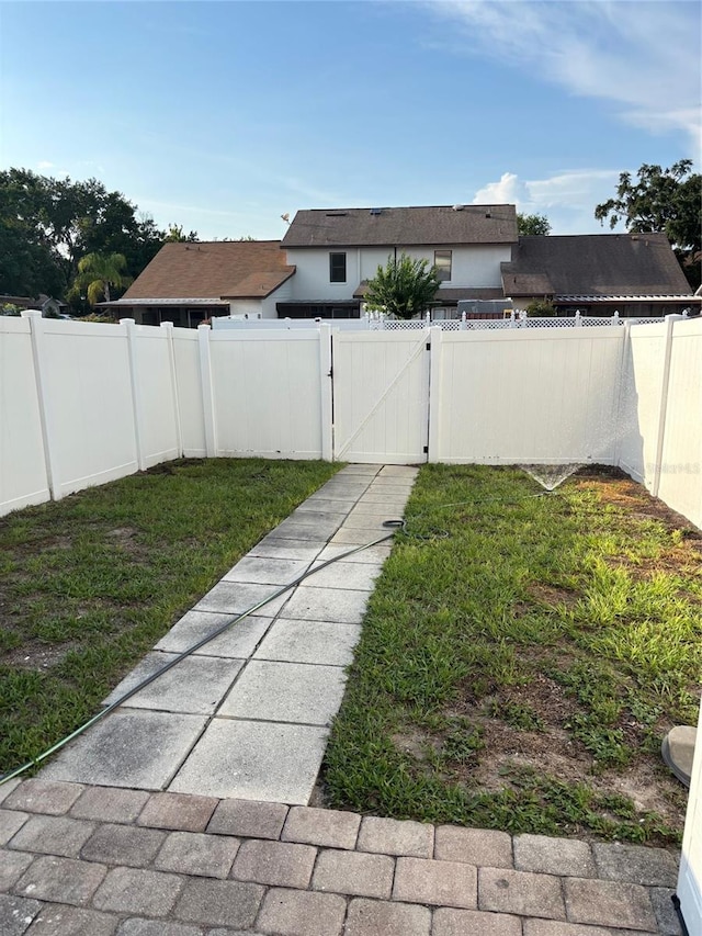 9471 Comeau St, Gotha, FL 34734 - view of yard with a gate