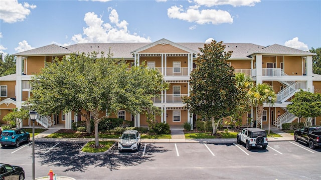 515 Rum Run Unit 33515, Davenport, FL 33897 - view of property featuring uncovered parking