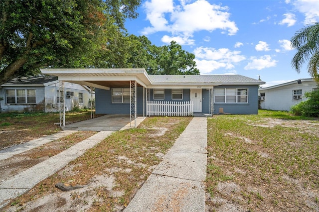 2307 Freemason St, Lakeland, FL 33801 - bungalow-style house featuring concrete driveway, covered porch, and an attached carport