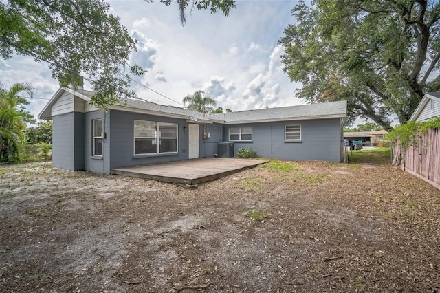 2307 Freemason St, Lakeland, FL 33801 - back of property with a wooden deck