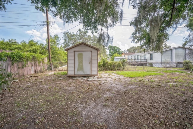2307 Freemason St, Lakeland, FL 33801 - view of yard featuring a storage unit