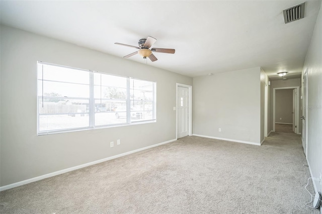 2307 Freemason St, Lakeland, FL 33801 - carpeted spare room featuring plenty of natural light and a ceiling fan