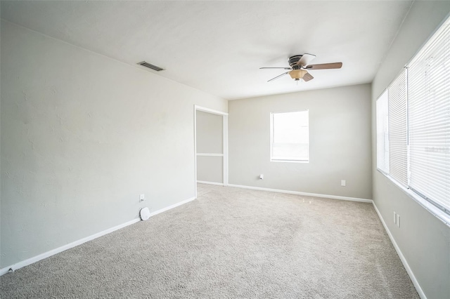 2307 Freemason St, Lakeland, FL 33801 - carpeted empty room with a ceiling fan and baseboards