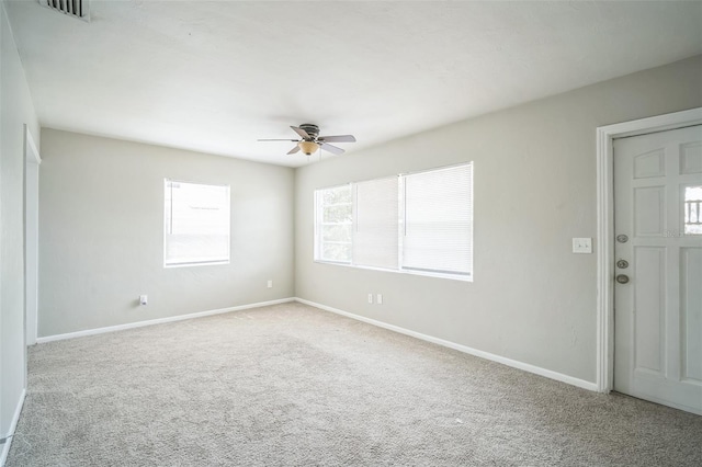 2307 Freemason St, Lakeland, FL 33801 - carpeted spare room with ceiling fan and baseboards