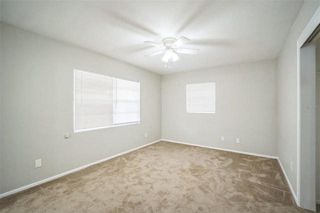 2307 Freemason St, Lakeland, FL 33801 - carpeted spare room with a ceiling fan and baseboards