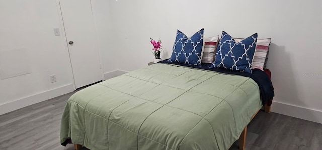 320 Forestway Cir Unit 107, Altamonte Springs, FL 32701 - bedroom featuring wood finished floors