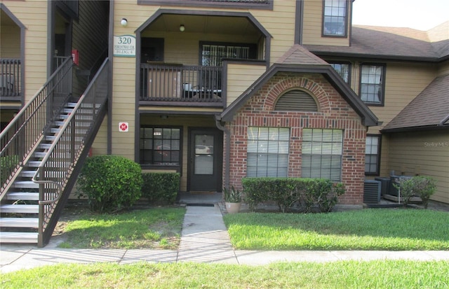 320 Forestway Cir Unit 107, Altamonte Springs, FL 32701 - entrance to property featuring brick siding and a balcony