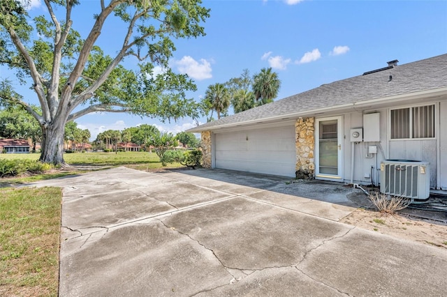 1115 Lake Francis Dr, Apopka, FL 32712 - garage featuring central air condition unit and concrete driveway