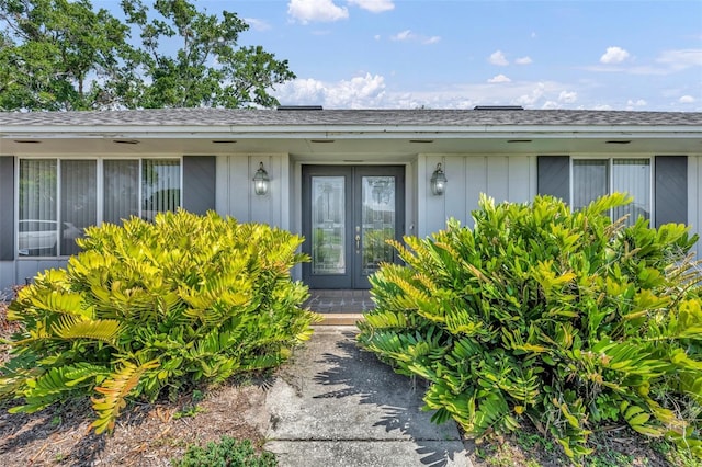 1115 Lake Francis Dr, Apopka, FL 32712 - doorway to property featuring roof with shingles and french doors