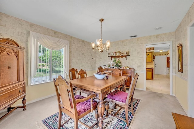 1115 Lake Francis Dr, Apopka, FL 32712 - dining area with light carpet, a chandelier, baseboards, and wallpapered walls