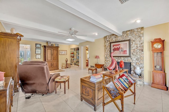 1115 Lake Francis Dr, Apopka, FL 32712 - living room featuring beamed ceiling, light tile patterned flooring, ceiling fan, and a fireplace