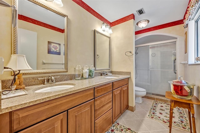 1115 Lake Francis Dr, Apopka, FL 32712 - bathroom with double vanity, toilet, a shower stall, and tile patterned flooring