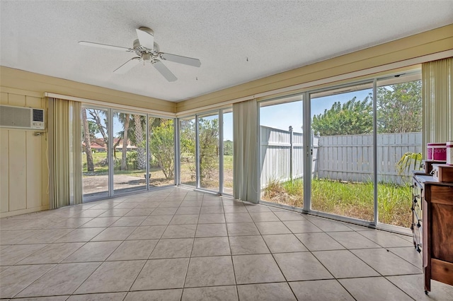 1115 Lake Francis Dr, Apopka, FL 32712 - unfurnished sunroom featuring ceiling fan and a wall mounted air conditioner