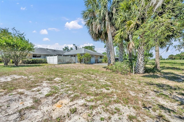 1115 Lake Francis Dr, Apopka, FL 32712 - view of yard featuring a garage