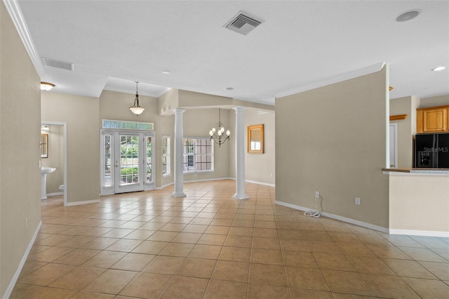 16729 Tall Grass Ln, Clermont, FL 34711 - spare room with ornate columns, ornamental molding, light tile patterned floors, baseboards, and recessed lighting