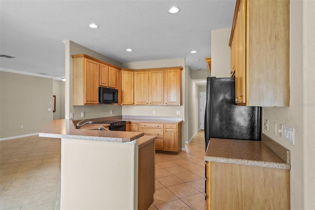 16729 Tall Grass Ln, Clermont, FL 34711 - kitchen with black appliances, light tile patterned floors, baseboards, a peninsula, and recessed lighting