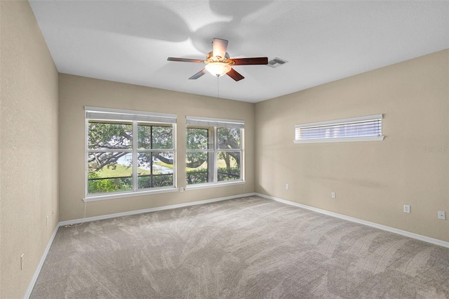 16729 Tall Grass Ln, Clermont, FL 34711 - carpeted empty room featuring a ceiling fan and baseboards