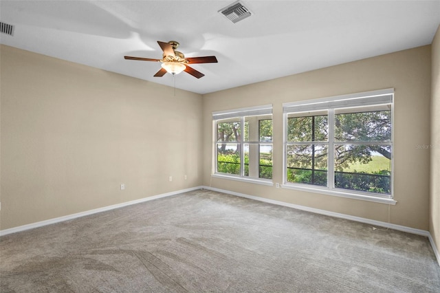 16729 Tall Grass Ln, Clermont, FL 34711 - carpeted spare room featuring a ceiling fan and baseboards