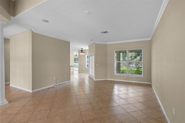 16729 Tall Grass Ln, Clermont, FL 34711 - empty room featuring ceiling fan, crown molding, light tile patterned floors, and decorative columns