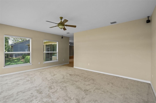 16729 Tall Grass Ln, Clermont, FL 34711 - empty room featuring ceiling fan and carpet