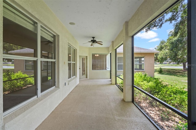 16729 Tall Grass Ln, Clermont, FL 34711 - unfurnished sunroom with a ceiling fan