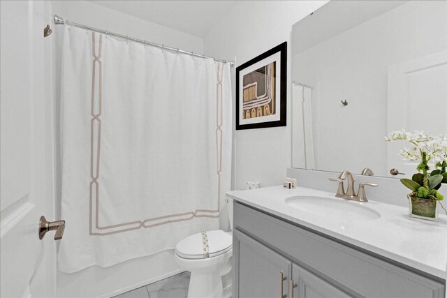 9239 Sommerset Hills Dr, Davenport, FL 33896 - full bath with vanity, marble finish floors, toilet, and shower / bathtub combination with curtain