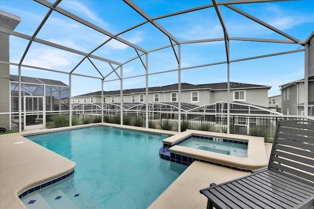 9239 Sommerset Hills Dr, Davenport, FL 33896 - view of swimming pool with a pool with connected hot tub, a residential view, and a lanai