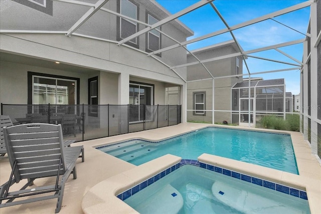 9239 Sommerset Hills Dr, Davenport, FL 33896 - view of pool with a patio, a lanai, and a pool with connected hot tub
