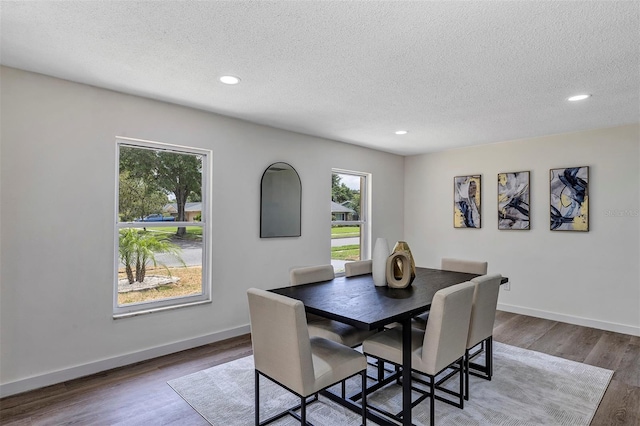 822 Glen Arden Way, Altamonte Springs, FL 32701 - dining area featuring plenty of natural light, recessed lighting, a textured ceiling, wood finished floors, and baseboards