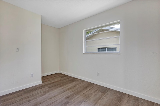 822 Glen Arden Way, Altamonte Springs, FL 32701 - spare room featuring wood finished floors and baseboards