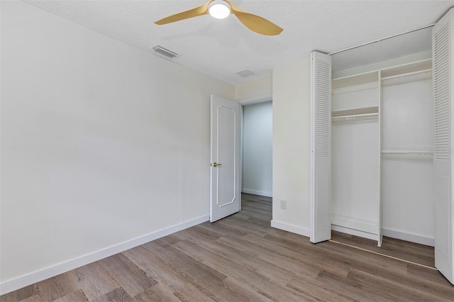 822 Glen Arden Way, Altamonte Springs, FL 32701 - unfurnished bedroom with wood finished floors, baseboards, a closet, and ceiling fan