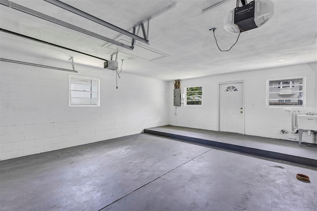 822 Glen Arden Way, Altamonte Springs, FL 32701 - garage with electric panel, a garage door opener, and concrete block wall