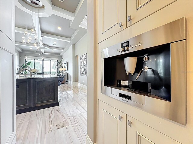 16246 Ravenna Ct, Montverde, FL 34756 - hallway featuring coffered ceiling, light marble finish flooring, a chandelier, baseboards, and beam ceiling