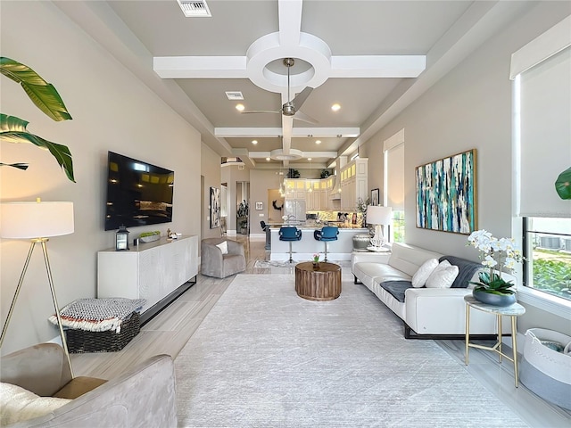 16246 Ravenna Ct, Montverde, FL 34756 - living room with coffered ceiling, light wood finished floors, recessed lighting, and beamed ceiling