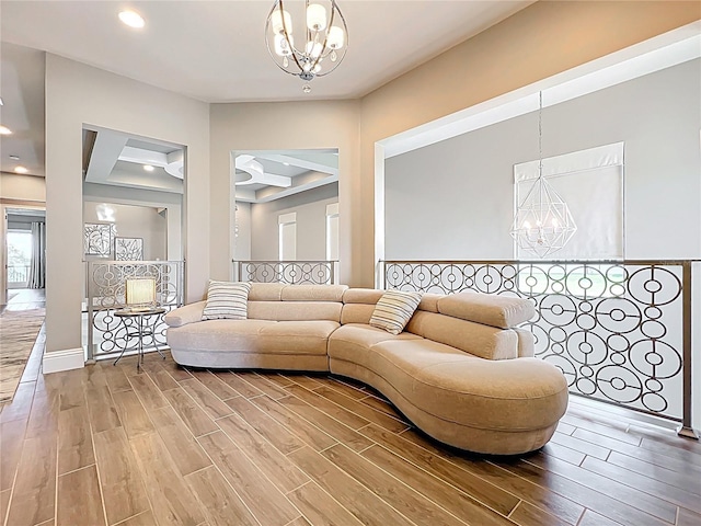 16246 Ravenna Ct, Montverde, FL 34756 - living room with a chandelier, wood finished floors, recessed lighting, and baseboards