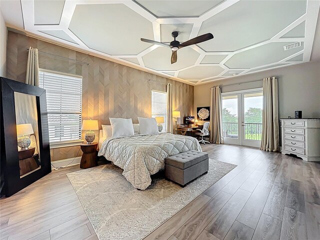 16246 Ravenna Ct, Montverde, FL 34756 - bedroom featuring access to outside, a desk, wood finished floors, wood walls, and a ceiling fan
