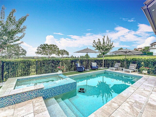 16246 Ravenna Ct, Montverde, FL 34756 - view of pool with a pool with connected hot tub