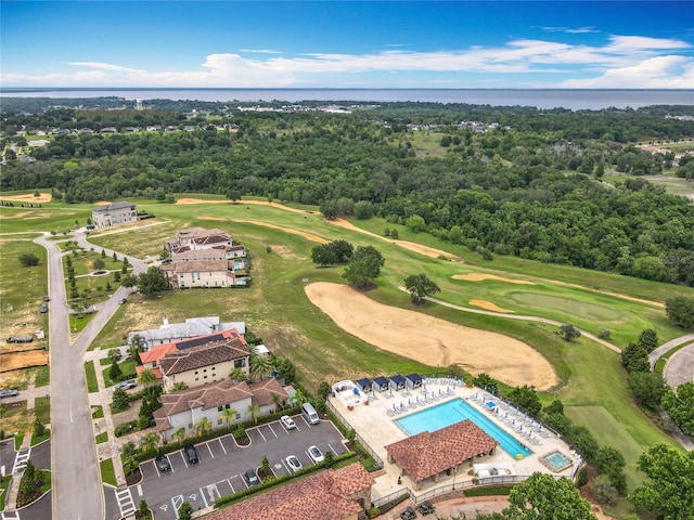 16246 Ravenna Ct, Montverde, FL 34756 - aerial view of a local golf course, a nearby body of water, and a pool area