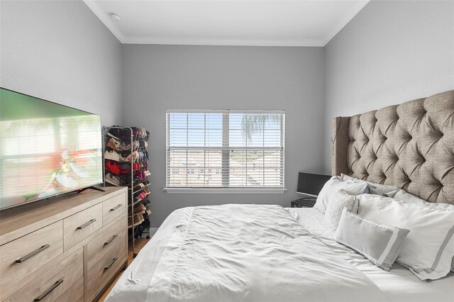 17404 Chateau Pine Way, Clermont, FL 34711 - bedroom featuring ornamental molding