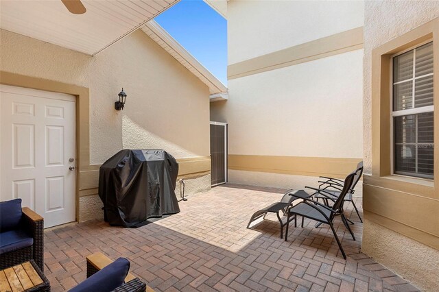 17404 Chateau Pine Way, Clermont, FL 34711 - view of patio / terrace with grilling area