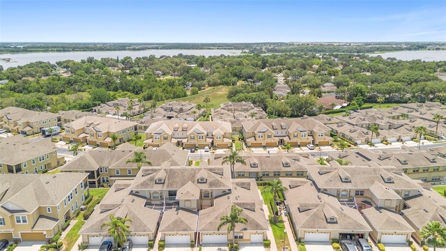 17404 Chateau Pine Way, Clermont, FL 34711 - aerial view of residential area featuring a nearby body of water
