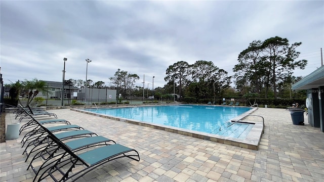 community pool with a patio