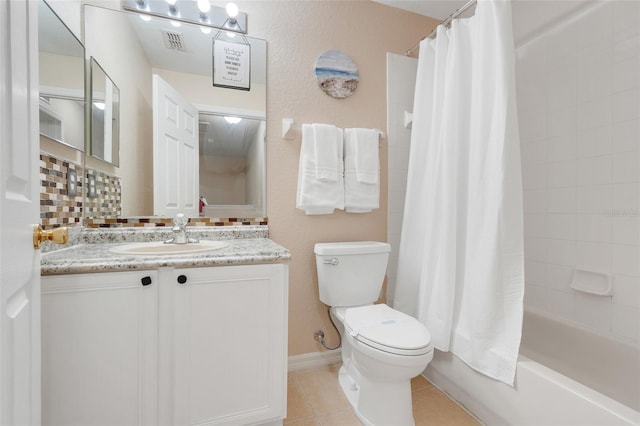 3938 Calabria Ave, Davenport, FL 33897 - bathroom with toilet, vanity, tile patterned flooring, and shower / bath combination with curtain
