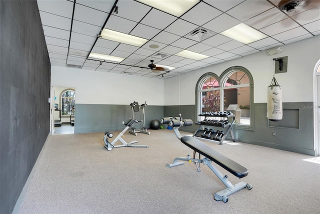 3938 Calabria Ave, Davenport, FL 33897 - exercise room featuring plenty of natural light and carpet