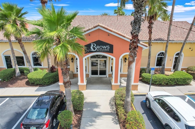 3938 Calabria Ave, Davenport, FL 33897 - view of building exterior featuring uncovered parking